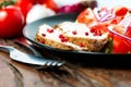 Oven baked pork in plate with salad and ingredients