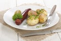 Oven baked potato with hungarian kolbasz