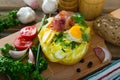 Baked potato stuffed with herbs, egg, bacon Royalty Free Stock Photo