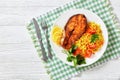 Oven baked salmon steak with yellow rice Royalty Free Stock Photo