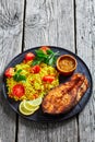 Oven baked salmon steak with yellow rice Royalty Free Stock Photo