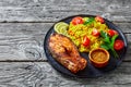 Oven baked salmon steak with yellow rice Royalty Free Stock Photo