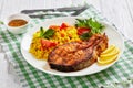 Oven baked salmon steak with yellow rice Royalty Free Stock Photo