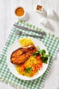 Oven baked salmon steak with yellow rice Royalty Free Stock Photo