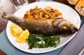 Oven baked sea bass fish Royalty Free Stock Photo