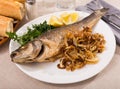 Oven baked sea bass fish Royalty Free Stock Photo