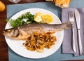 Oven baked sea bass fish Royalty Free Stock Photo