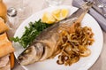 Oven baked sea bass fish Royalty Free Stock Photo