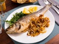 Oven baked sea bass fish Royalty Free Stock Photo