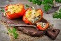 Oven baked sweet paprikas stuffed with mushrooms in cream sauce Royalty Free Stock Photo