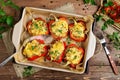 Oven baked sweet paprikas stuffed with mushrooms in cream sauce Royalty Free Stock Photo