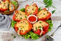 Oven baked sweet paprikas stuffed with mushrooms in cream sauce Royalty Free Stock Photo