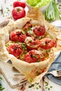 Oven baked tomatoes stuffed with spinach, cheese and herbs