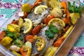 Oven baked trout and vegetables