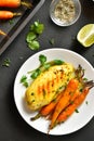 Oven baked turmeric chicken breast with carrots