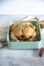 Oven bakes chicken with veggies and mushrooms Royalty Free Stock Photo