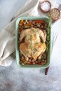 Oven bakes chicken with veggies and mushrooms Royalty Free Stock Photo