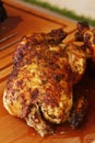 Oven roasted marinated whole chicken on a carvery station Royalty Free Stock Photo