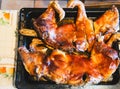 oven-roasted suckling pig, golden brown and crispy, traditional food increase in food costs spain
