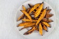 Oven roasted sweet potato wedges Royalty Free Stock Photo