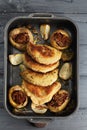 Oven tray with cordon bleu cutlets overhead