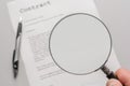 Contract with empty magnifying glass as a template for further processing