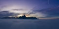 Over cloud carpet with hahnenkamm mountains at misty