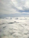 Over cloudy sky while in the plane, what a beautifull scenery