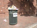 Over filled public trash receptacle