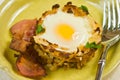 Egg in potato nest with bacon Royalty Free Stock Photo