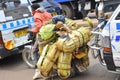 Over loaded with goods  on a motorcycle Royalty Free Stock Photo