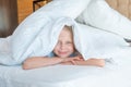 Over head sleep girl pain blanket phone young beautiful view, concept morning white from pillow from health calm Royalty Free Stock Photo