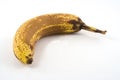Over ripe bananna on white Royalty Free Stock Photo