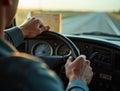 Over the Shoulder View of a Driver Navigating a Long Road with a Map on the Dashboard at Dusk Royalty Free Stock Photo
