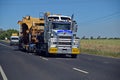Over size truck carry a mining machinery in NSW outback Australia Royalty Free Stock Photo