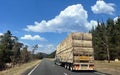 Over size truck transporting large shipment of hay Royalty Free Stock Photo