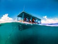 Over under view of seabed scuba diving boat Royalty Free Stock Photo