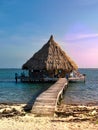 An over-water bungalow in Glover`s Atoll, Belize