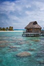 Over-water bungalow luxury in tropical lagoon