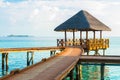 Over water bungalows with steps into amazing green lagoon