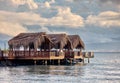 Over water bungalows steps into the sea Royalty Free Stock Photo