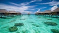 Over water villas and white sand beach on tropical isl. Generative ai Royalty Free Stock Photo