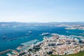 Overall view from top of the Rock of Gibraltar city, cruise port and marina, airport runway, Gibraltar Bay or Bay of Algeciras.