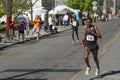 Overall winner Belete Assefa of Ethiopia takes the lead from Emmanual Bett of Kenya at Bloomsday 2013