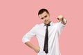The overbearing businessman point you and want you, half length closeup portrait on pink background.