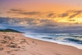 Overcast cloudy sunrise over a rough Indian Ocean from a view point on a beach in Port Shepstone, Kwa-Zulu Natal, South Africa