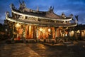 Dalongdong Baoan Temple on rainy night Tapei Taiwan