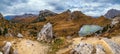 Overcast morning autumn alpine Dolomites mountain scene. Peaceful Valparola Path and Lake view, Belluno, Italy Royalty Free Stock Photo