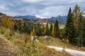 Overcast morning autumn alpine Dolomites mountain scene. Peaceful Valparola Path view, Belluno, Italy Royalty Free Stock Photo