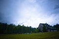 Overcast Sky over Mountain Lodge Royalty Free Stock Photo